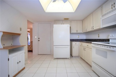 Outstanding opportunity! The least expensive condo with a garage on Falcon Watch Golf Club in Florida - for sale on GolfHomes.com, golf home, golf lot