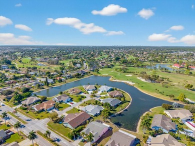 Wake up to fantastic lake views teeming with wildlife and admire on Royal Palm Golf Club in Florida - for sale on GolfHomes.com, golf home, golf lot