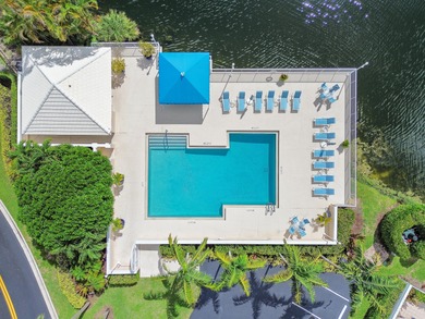 Immaculate golf course home located in the prestigious Barclay on PGA National Golf Club in Florida - for sale on GolfHomes.com, golf home, golf lot