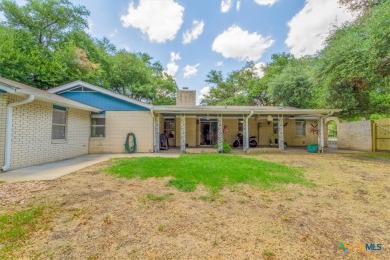 Beautifully updated home on a spacious corner lot, conveniently on Sammons Golf Links in Texas - for sale on GolfHomes.com, golf home, golf lot