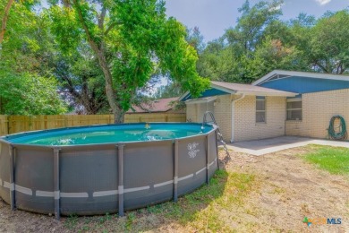 Beautifully updated home on a spacious corner lot, conveniently on Sammons Golf Links in Texas - for sale on GolfHomes.com, golf home, golf lot