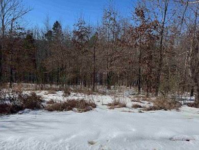 This 0.70-acre lot is located in a newer subdivision on the on Pine Hills Golf Course in Arkansas - for sale on GolfHomes.com, golf home, golf lot