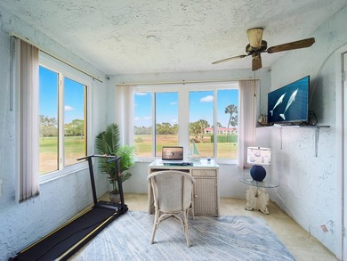 Charming 1BR/1.5BA condo overlooking the golf course in the on Miles Grant Country Club in Florida - for sale on GolfHomes.com, golf home, golf lot