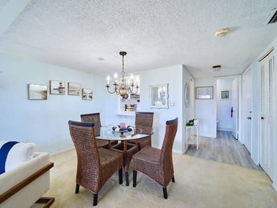 Charming 1BR/1.5BA condo overlooking the golf course in the on Miles Grant Country Club in Florida - for sale on GolfHomes.com, golf home, golf lot