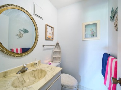 Charming 1BR/1.5BA condo overlooking the golf course in the on Miles Grant Country Club in Florida - for sale on GolfHomes.com, golf home, golf lot