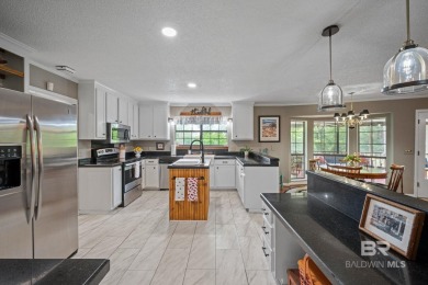 Welcome to this beautifully updated brick ranch nestled on a on Vanity Fair Golf and Tennis Club in Alabama - for sale on GolfHomes.com, golf home, golf lot
