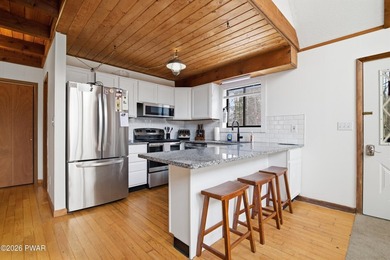 Welcome to this charming 4-bedroom, 2-bath chalet in The Hideout on The Hideout Golf in Pennsylvania - for sale on GolfHomes.com, golf home, golf lot