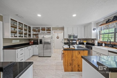 Welcome to this beautifully updated brick ranch nestled on a on Vanity Fair Golf and Tennis Club in Alabama - for sale on GolfHomes.com, golf home, golf lot