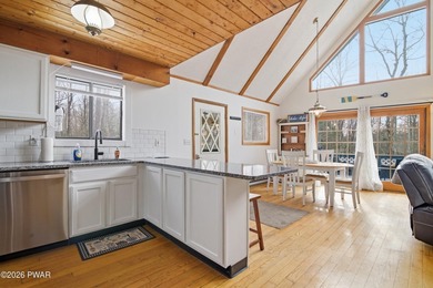 Welcome to this charming 4-bedroom, 2-bath chalet in The Hideout on The Hideout Golf in Pennsylvania - for sale on GolfHomes.com, golf home, golf lot