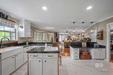 Welcome to this beautifully updated brick ranch nestled on a on Vanity Fair Golf and Tennis Club in Alabama - for sale on GolfHomes.com, golf home, golf lot