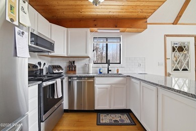 Welcome to this charming 4-bedroom, 2-bath chalet in The Hideout on The Hideout Golf in Pennsylvania - for sale on GolfHomes.com, golf home, golf lot