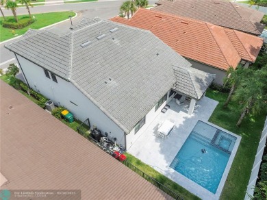 Beautifully upgraded pool home on the golf course. Boasting 4 on Woodmont Country Club in Florida - for sale on GolfHomes.com, golf home, golf lot