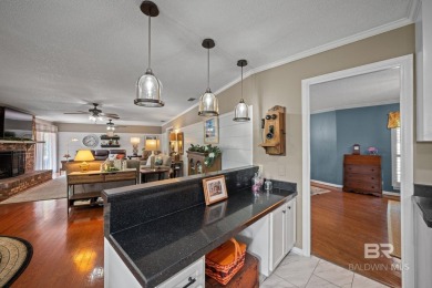 Welcome to this beautifully updated brick ranch nestled on a on Vanity Fair Golf and Tennis Club in Alabama - for sale on GolfHomes.com, golf home, golf lot