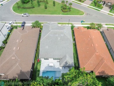 Beautifully upgraded pool home on the golf course. Boasting 4 on Woodmont Country Club in Florida - for sale on GolfHomes.com, golf home, golf lot