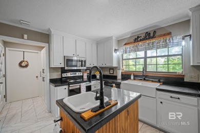 Welcome to this beautifully updated brick ranch nestled on a on Vanity Fair Golf and Tennis Club in Alabama - for sale on GolfHomes.com, golf home, golf lot