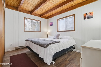 Welcome to this charming 4-bedroom, 2-bath chalet in The Hideout on The Hideout Golf in Pennsylvania - for sale on GolfHomes.com, golf home, golf lot