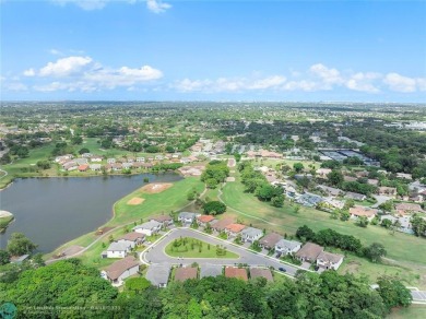 Beautifully upgraded pool home on the golf course. Boasting 4 on Woodmont Country Club in Florida - for sale on GolfHomes.com, golf home, golf lot