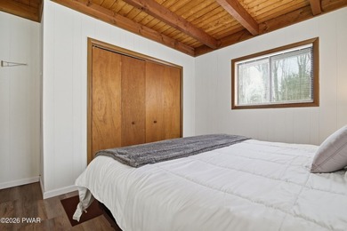 Welcome to this charming 4-bedroom, 2-bath chalet in The Hideout on The Hideout Golf in Pennsylvania - for sale on GolfHomes.com, golf home, golf lot