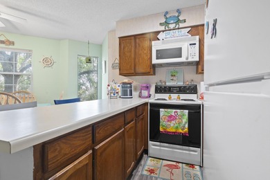 Welcome to your new coastal escape--just a breezy golf cart ride on Beachwood Golf Club in South Carolina - for sale on GolfHomes.com, golf home, golf lot