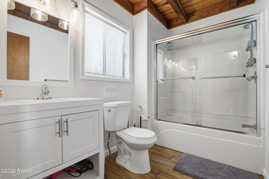 Welcome to this charming 4-bedroom, 2-bath chalet in The Hideout on The Hideout Golf in Pennsylvania - for sale on GolfHomes.com, golf home, golf lot