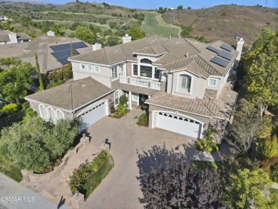 Welcome to a masterpiece of Mediterranean elegance located in on Moorpark Country Club in California - for sale on GolfHomes.com, golf home, golf lot