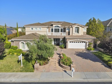 Welcome to a masterpiece of Mediterranean elegance located in on Moorpark Country Club in California - for sale on GolfHomes.com, golf home, golf lot