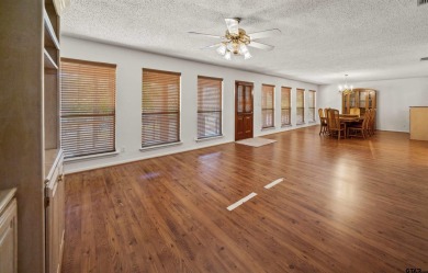 This property at Holly Lake Ranch offers a large covered front on Holly Lake Ranch Golf Club in Texas - for sale on GolfHomes.com, golf home, golf lot