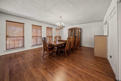 This property at Holly Lake Ranch offers a large covered front on Holly Lake Ranch Golf Club in Texas - for sale on GolfHomes.com, golf home, golf lot