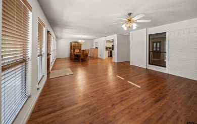 This property at Holly Lake Ranch offers a large covered front on Holly Lake Ranch Golf Club in Texas - for sale on GolfHomes.com, golf home, golf lot