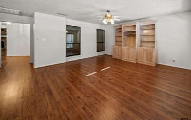 This property at Holly Lake Ranch offers a large covered front on Holly Lake Ranch Golf Club in Texas - for sale on GolfHomes.com, golf home, golf lot