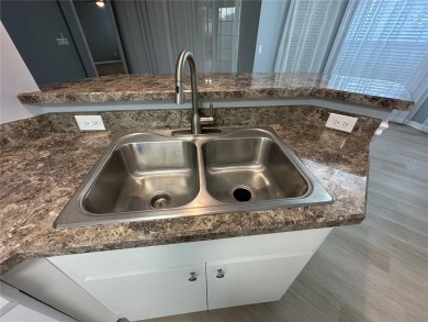 Thousands of Dollars Spent Remodeling Popular Wakefield model on On Top of the World Golf Course in Florida - for sale on GolfHomes.com, golf home, golf lot