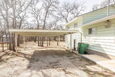 Slow down and enjoy the good with this ideal getaway or on Nocona Hills Golf Course in Texas - for sale on GolfHomes.com, golf home, golf lot