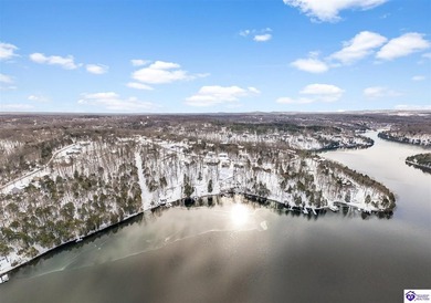 Welcome to 190 Strawberry Circle, a rare lakefront home for sale on Doe Valley Country Club in Kentucky - for sale on GolfHomes.com, golf home, golf lot