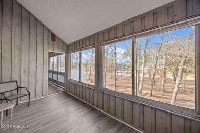 Fully furnished and thoughtfully updated, this two-level condo on Harbour Point Golf Club in North Carolina - for sale on GolfHomes.com, golf home, golf lot