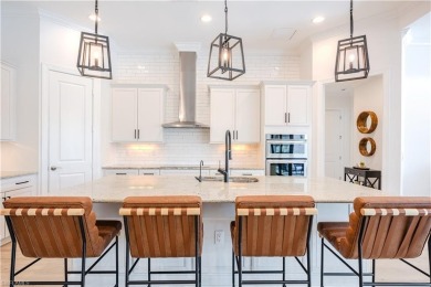 Welcome to your dream home in the exclusive lakefront community on The Golf Lodge At the Quarry in Florida - for sale on GolfHomes.com, golf home, golf lot