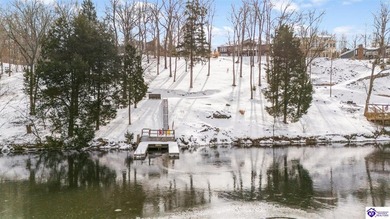 Welcome to 190 Strawberry Circle, a rare lakefront home for sale on Doe Valley Country Club in Kentucky - for sale on GolfHomes.com, golf home, golf lot