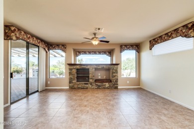 Welcome to this spectacular golf course home with stack stone on Quail Creek Country Club - Coyote in Arizona - for sale on GolfHomes.com, golf home, golf lot