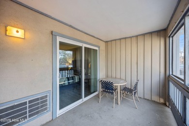 Fully furnished and thoughtfully updated, this two-level condo on Harbour Point Golf Club in North Carolina - for sale on GolfHomes.com, golf home, golf lot