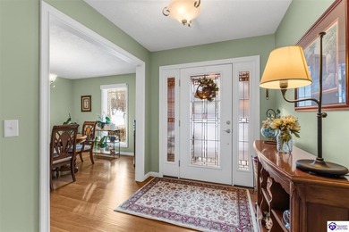 Welcome to 190 Strawberry Circle, a rare lakefront home for sale on Doe Valley Country Club in Kentucky - for sale on GolfHomes.com, golf home, golf lot