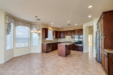 Welcome to this spectacular golf course home with stack stone on Quail Creek Country Club - Coyote in Arizona - for sale on GolfHomes.com, golf home, golf lot