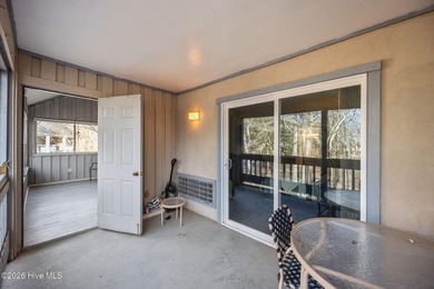 Fully furnished and thoughtfully updated, this two-level condo on Harbour Point Golf Club in North Carolina - for sale on GolfHomes.com, golf home, golf lot