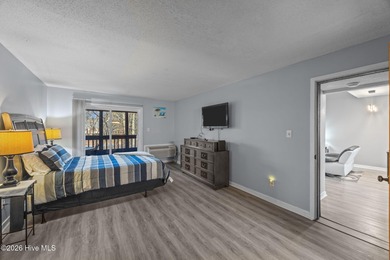 Fully furnished and thoughtfully updated, this two-level condo on Harbour Point Golf Club in North Carolina - for sale on GolfHomes.com, golf home, golf lot