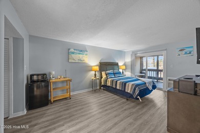 Fully furnished and thoughtfully updated, this two-level condo on Harbour Point Golf Club in North Carolina - for sale on GolfHomes.com, golf home, golf lot