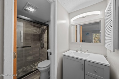 Fully furnished and thoughtfully updated, this two-level condo on Harbour Point Golf Club in North Carolina - for sale on GolfHomes.com, golf home, golf lot