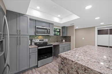Beautifully updated and turnkey 1st floor unit #438 and #439 in on Palm Beach Polo and Country Club in Florida - for sale on GolfHomes.com, golf home, golf lot