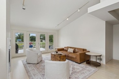 FRESH AND SLEEK CONDOMINIUM combining clean lines with practical on Elks Lodge 590 in Iowa - for sale on GolfHomes.com, golf home, golf lot