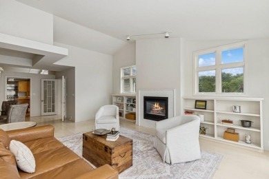 FRESH AND SLEEK CONDOMINIUM combining clean lines with practical on Elks Lodge 590 in Iowa - for sale on GolfHomes.com, golf home, golf lot