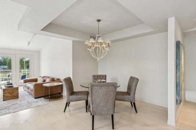 FRESH AND SLEEK CONDOMINIUM combining clean lines with practical on Elks Lodge 590 in Iowa - for sale on GolfHomes.com, golf home, golf lot
