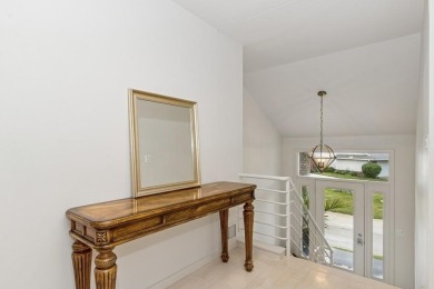 FRESH AND SLEEK CONDOMINIUM combining clean lines with practical on Elks Lodge 590 in Iowa - for sale on GolfHomes.com, golf home, golf lot