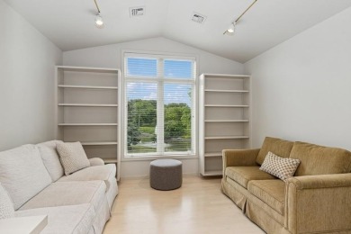 FRESH AND SLEEK CONDOMINIUM combining clean lines with practical on Elks Lodge 590 in Iowa - for sale on GolfHomes.com, golf home, golf lot